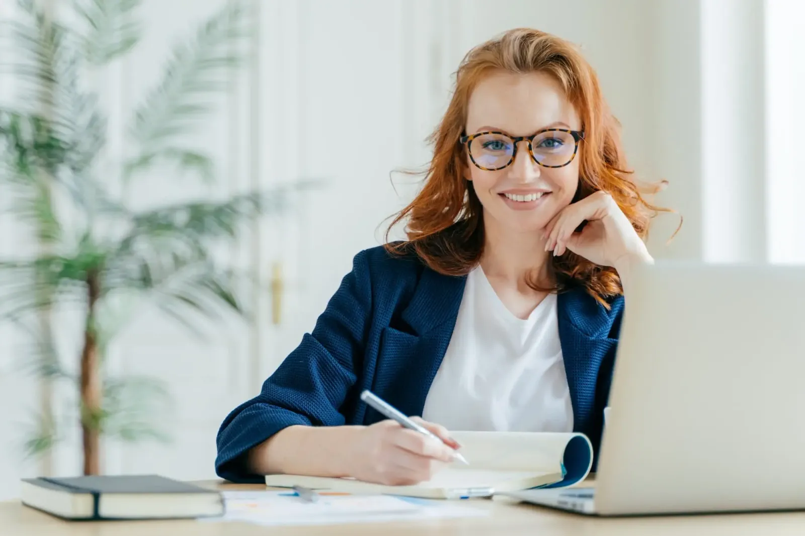 happy successful female writes checklist in notepa 2023 11 27 05 34 24 utc