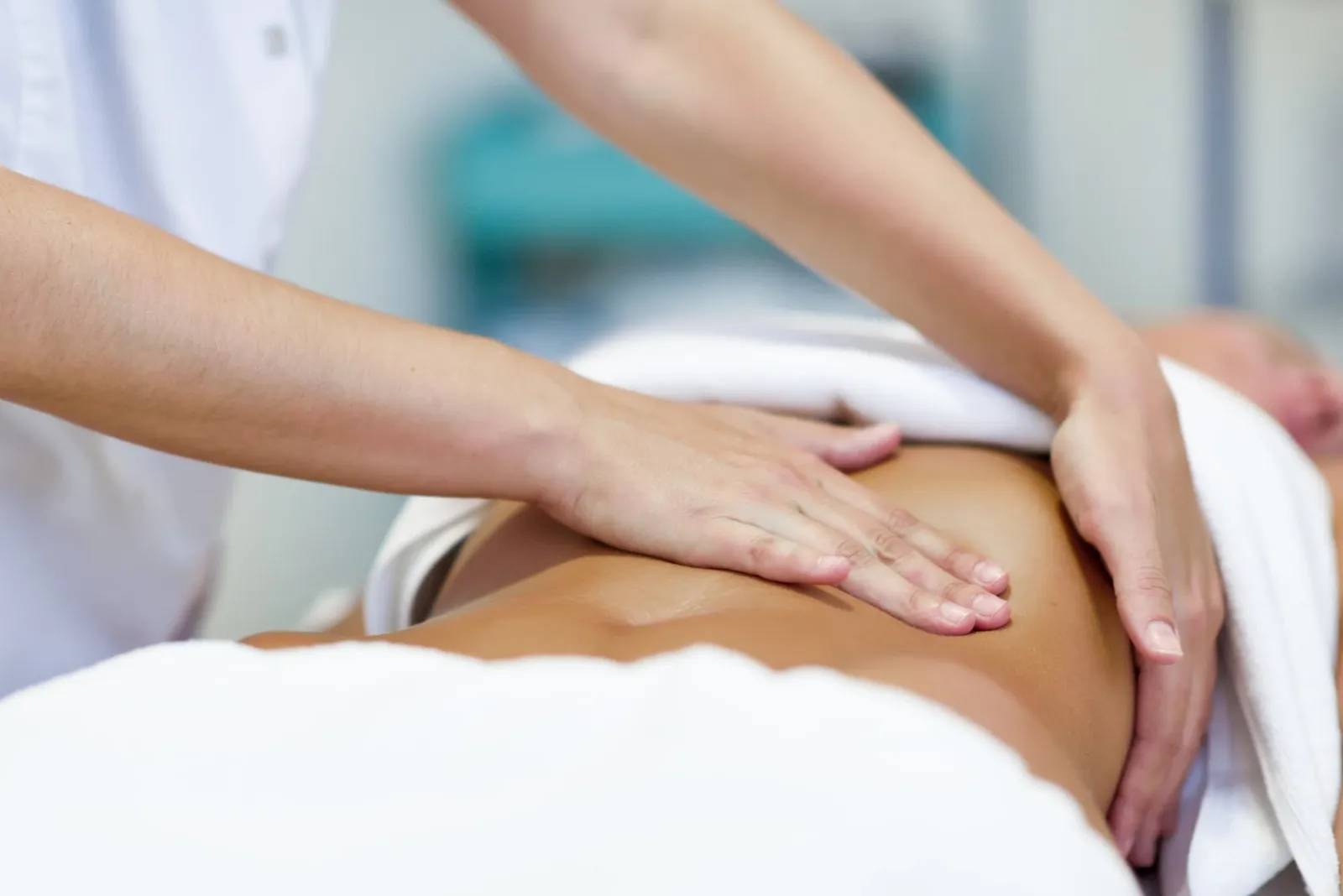 woman-having-abdomen-massage-by-professional-osteo-2021-08-26-20-00-10-utc Woman having abdomen massage by professional osteo 2021 08 26 20 00 10 utc